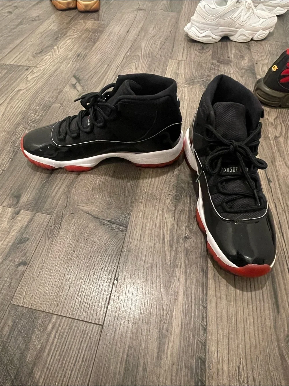 Jordan Bred 11s Retro High-Top Sneakers (Size 12)